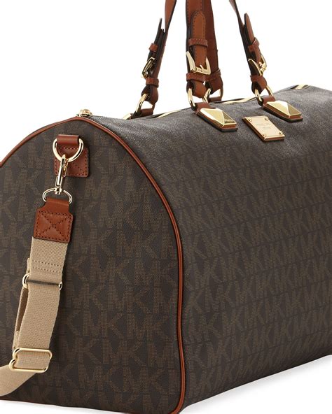 michael kors duffle bag luggage|Michael Kors large suitcase.